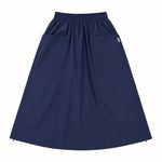 A navy blue scrub skirt with an elastic waistband and two front pockets, shown flat against a white background.